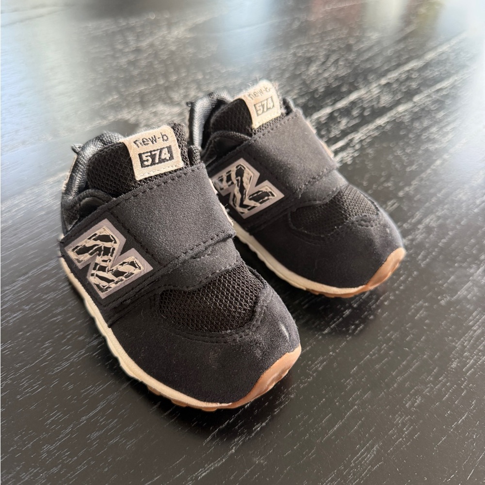 New Balance Infant or Toddler Black and White Sneakers